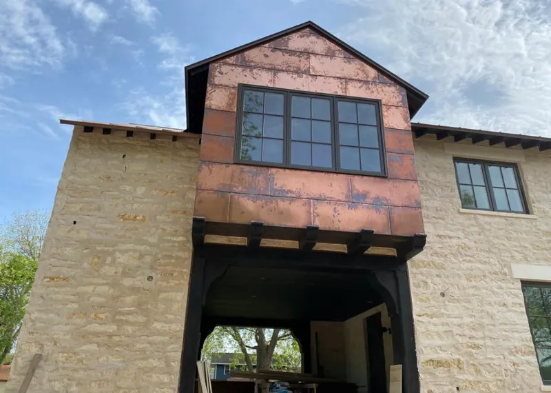 Copper metal panel facade on a stone building for Metal Roof Coating in Duryea